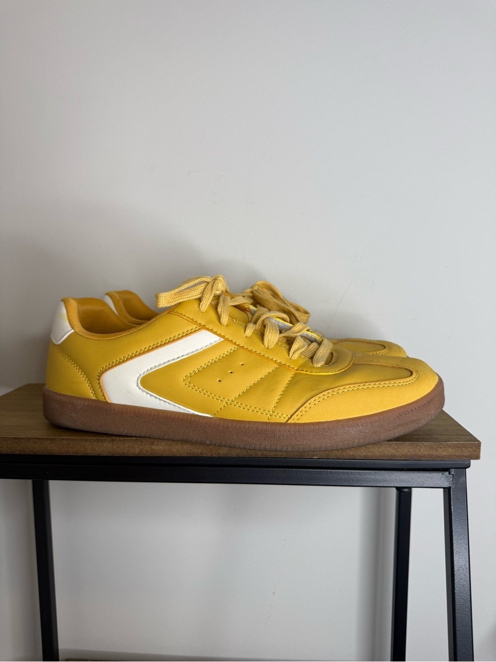 yellow and white No Boundaries soccer-style sneakers